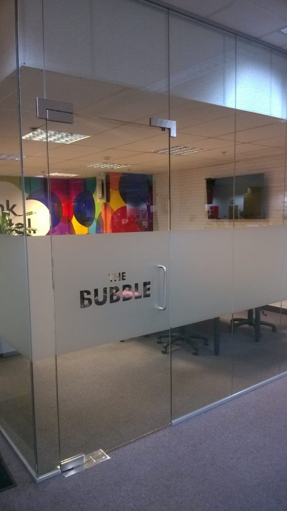 Fully glazed floor to ceiling partition at Express and Star offices in